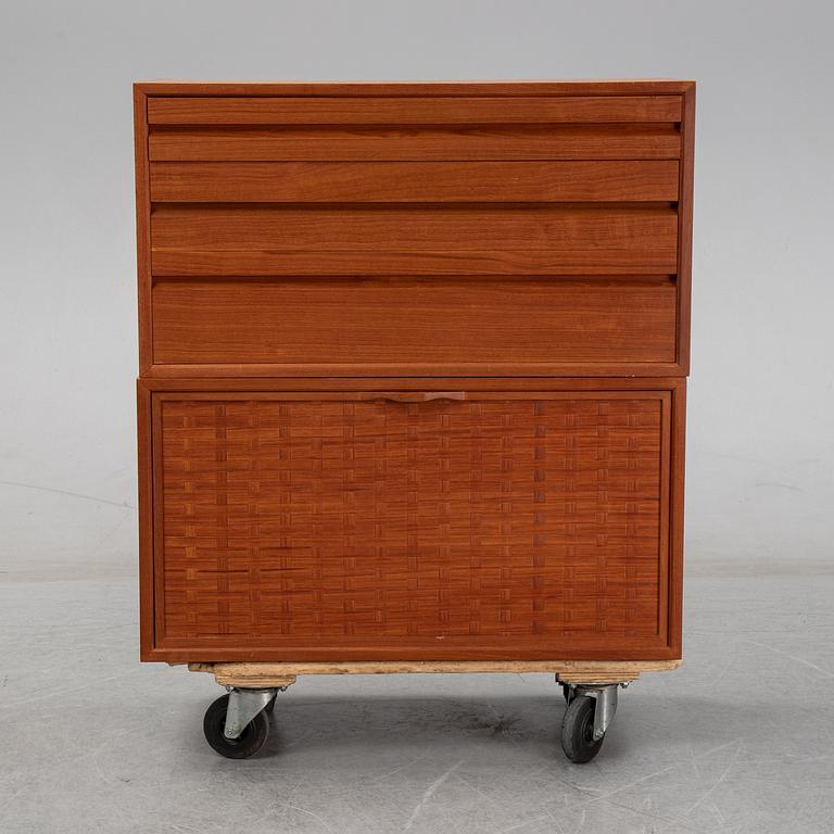 A 1960's teak shelving system by Poul Cadovius.