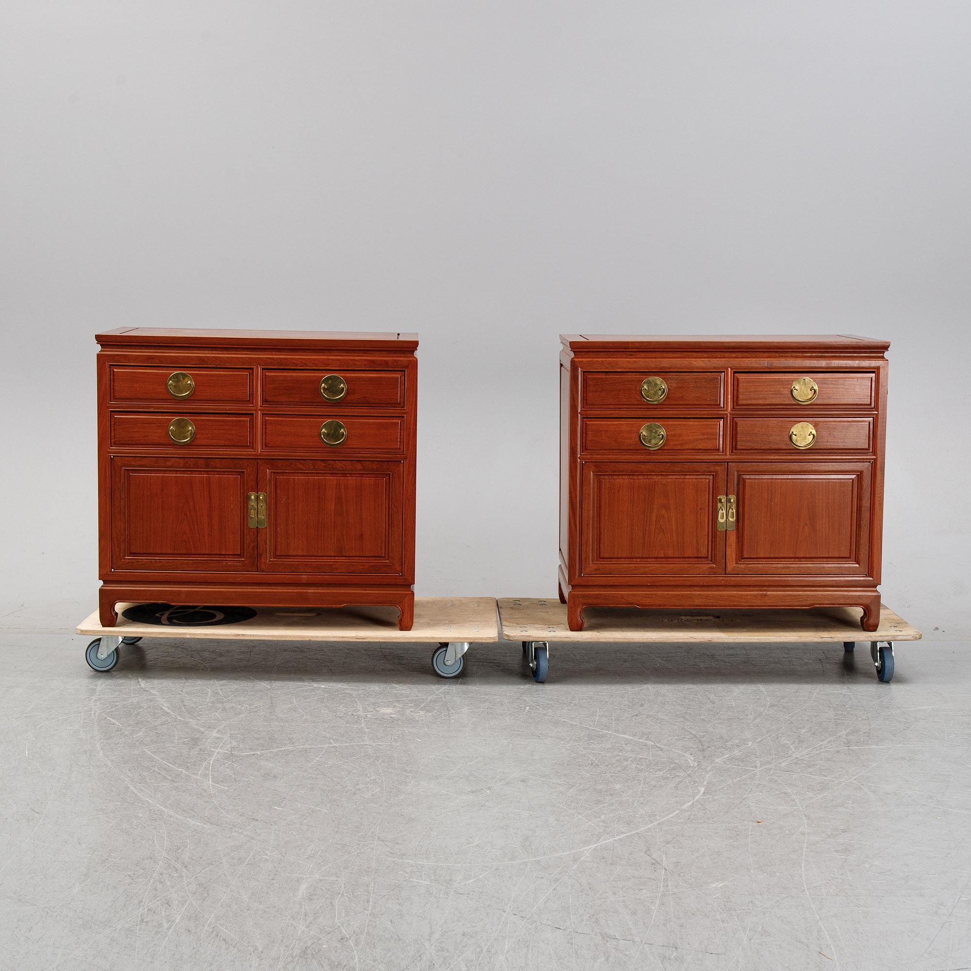 A pair of cupboards or sideboards, Yuen Cheong Furniture Co, Hong Kong, second half of the 20th century.