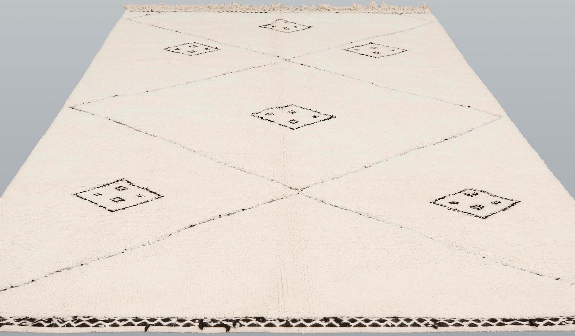 A moroccan carpet, ca 300 x 200 cm.