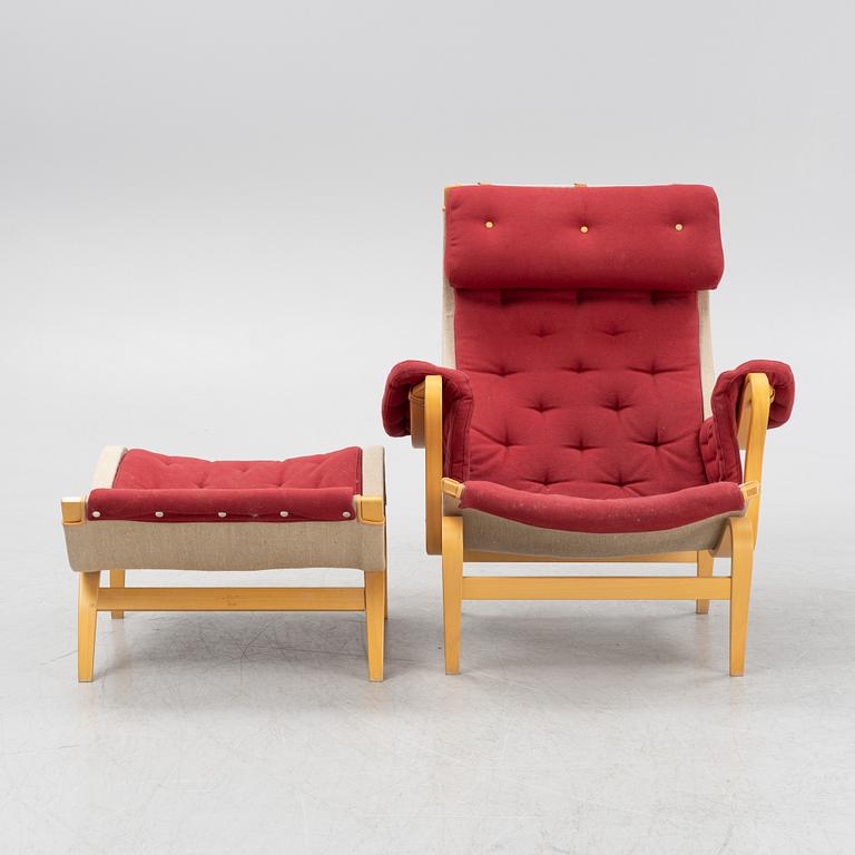 Bruno Mathsson, a 'Pernilla' armchair and a stool, Dux.