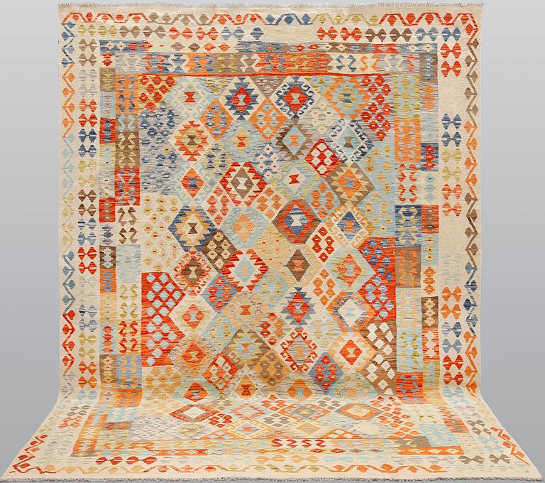 A kilim carpet, ca 350 x 258 cm.
