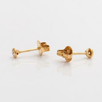 Tiffany & Co, Elsa Peretti, a pair of 18K gold 'Diamonds by The Yard' earrings with brilliant-cut diamonds.