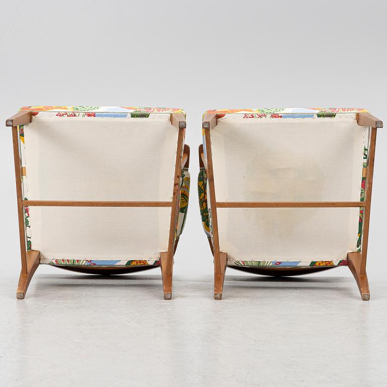 Josef Frank, a pair of model 695 armchairs, Svenskt Tenn.