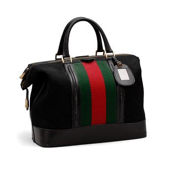 867. GUCCI, a black monogram canvas "Boston Bag".