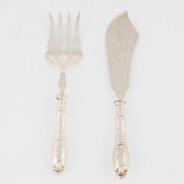 A silver carving knife and fork set, circa 1900.