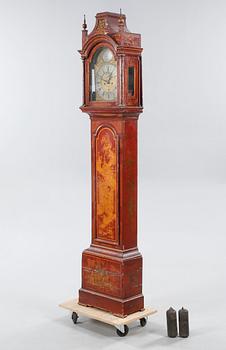 A grandfather clock, dial marked "John Thompson, England", 19th century.