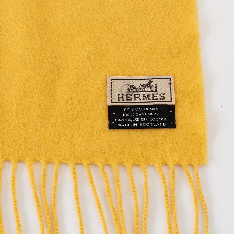 Hermès, a yellow cashmere scarf.