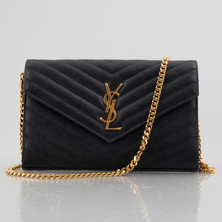 Yves Saint Laurent, a handbag/clutch.