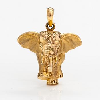 A 14K gold elefant shaped pendant.