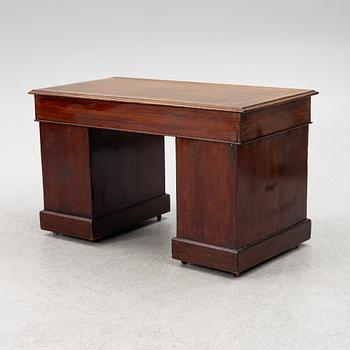 An English style desk, circa 1900.