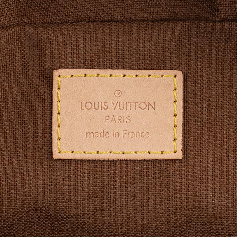 Louis Vuitton, 'Eole 50' travel bag.