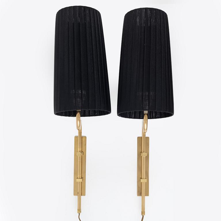 A pair of brass wall lights from Bergboms, second half of the 20th Century. Marked.