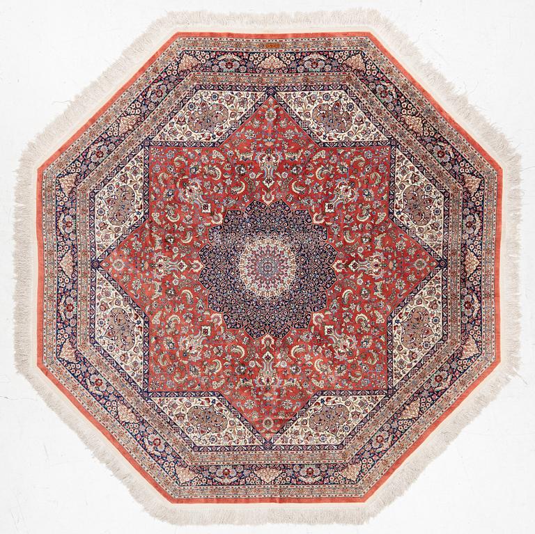 An Oktagonal  silk Qum rug, Central Persia, signed, c. 250 x 250 cm.