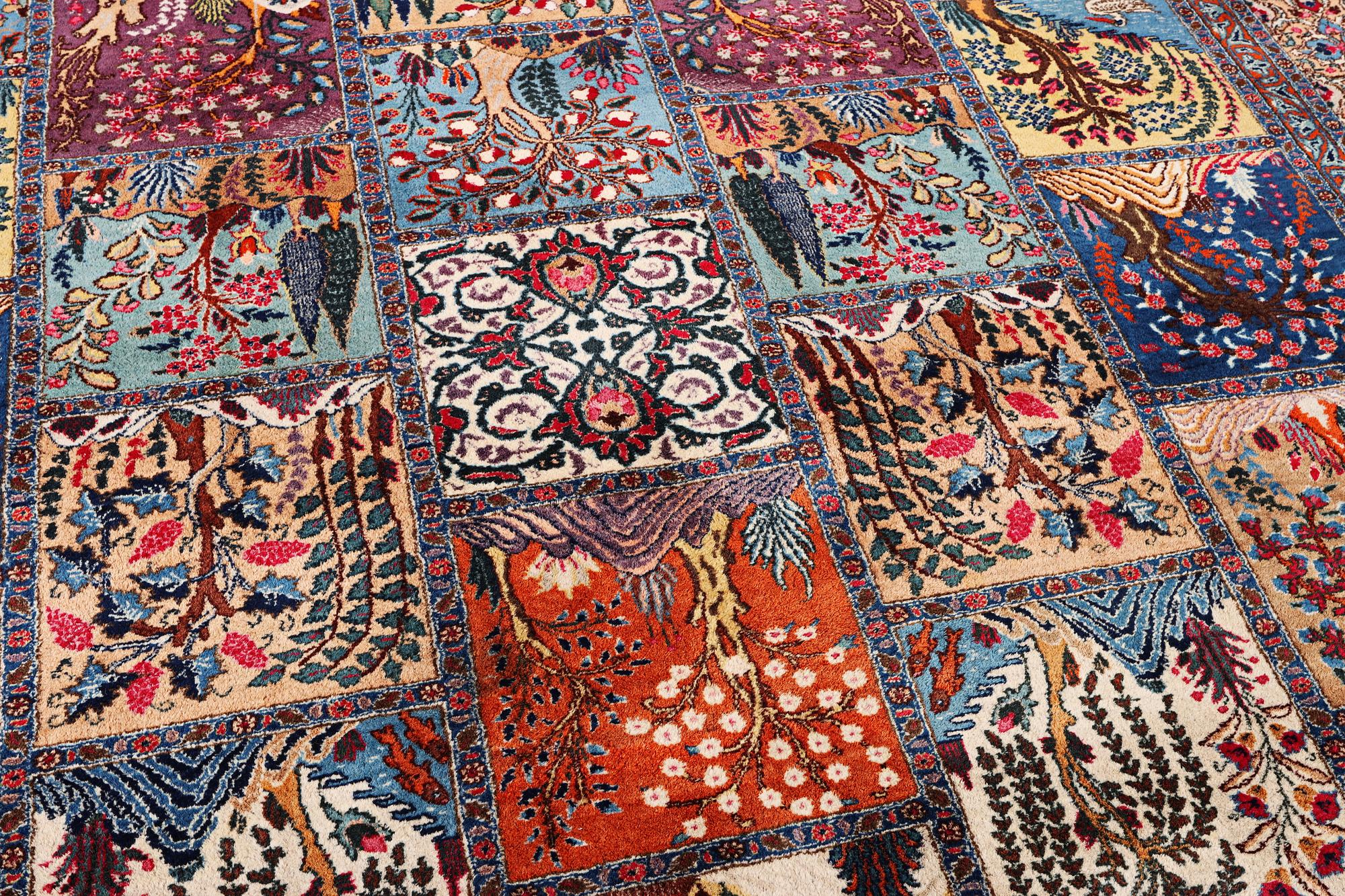 A Kashmar carpet, c. 387 x 297 cm.