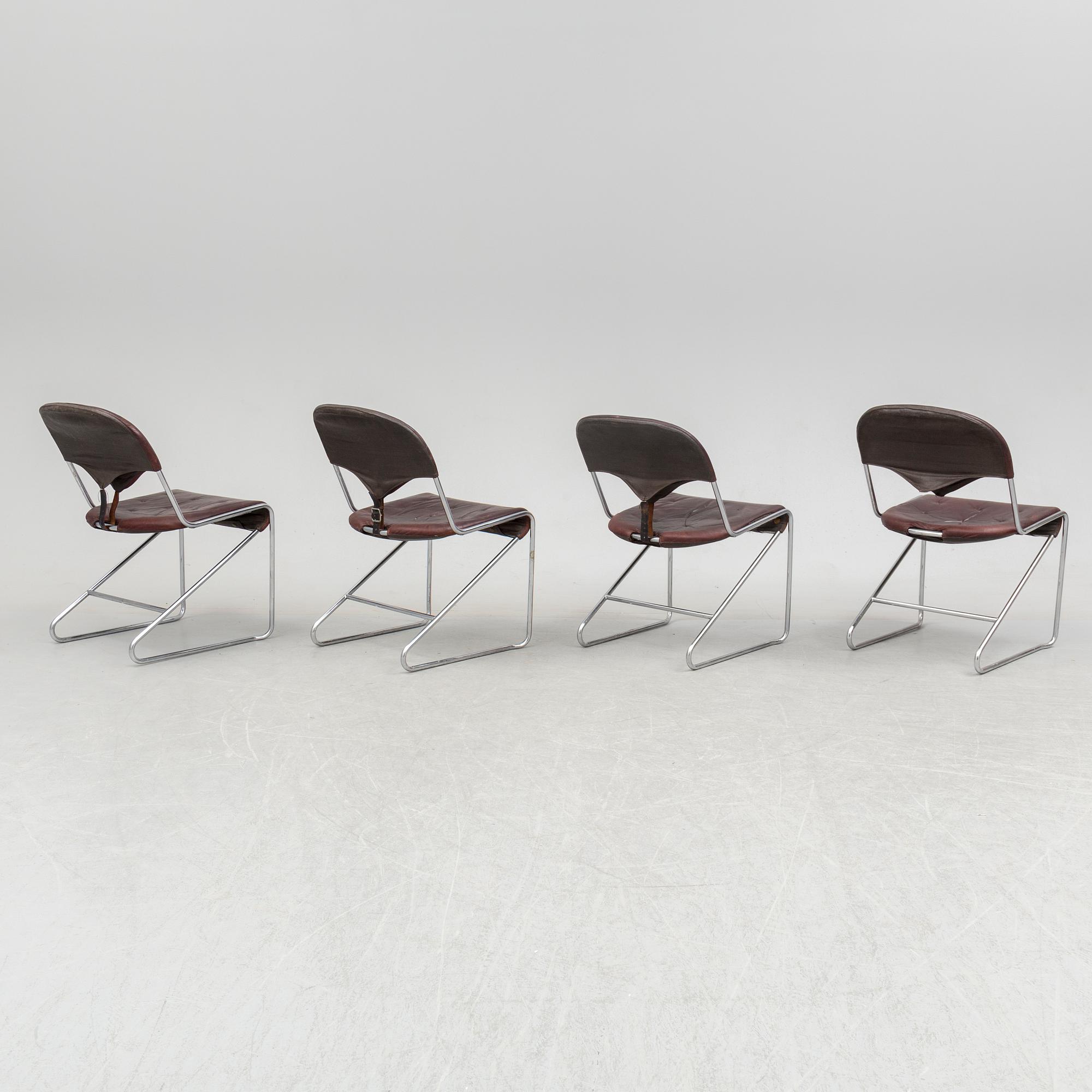 A set of four chairs by Sam Larsson, Dux, late 20th century.