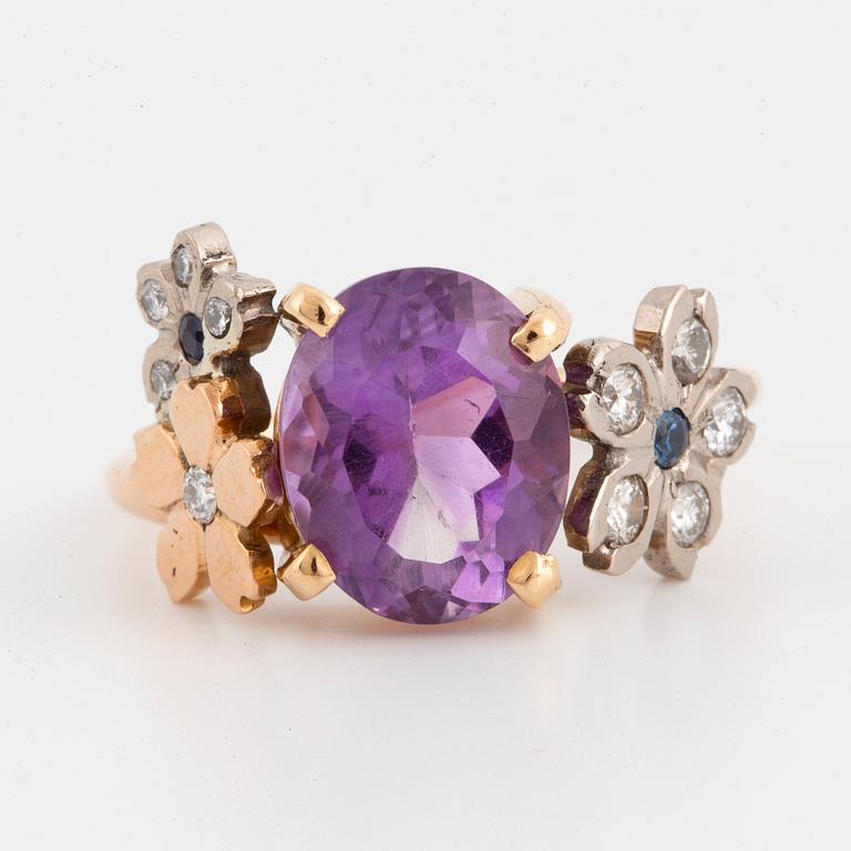 Oval faceted amethyst, brilliant-cut diamond and sapphire flower ring.