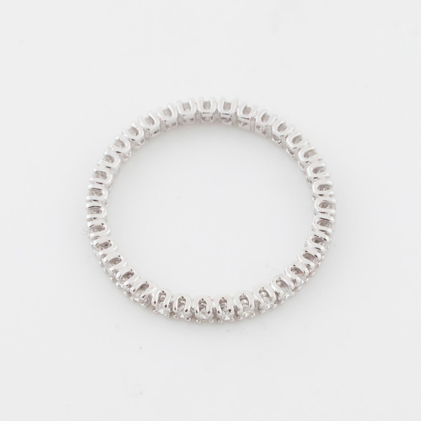 A brilliant cut diamond ring.