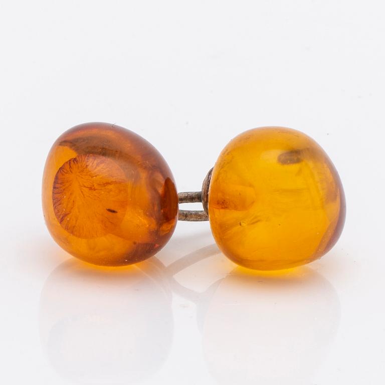 Amber set in silver, pendant, ring and earrings.