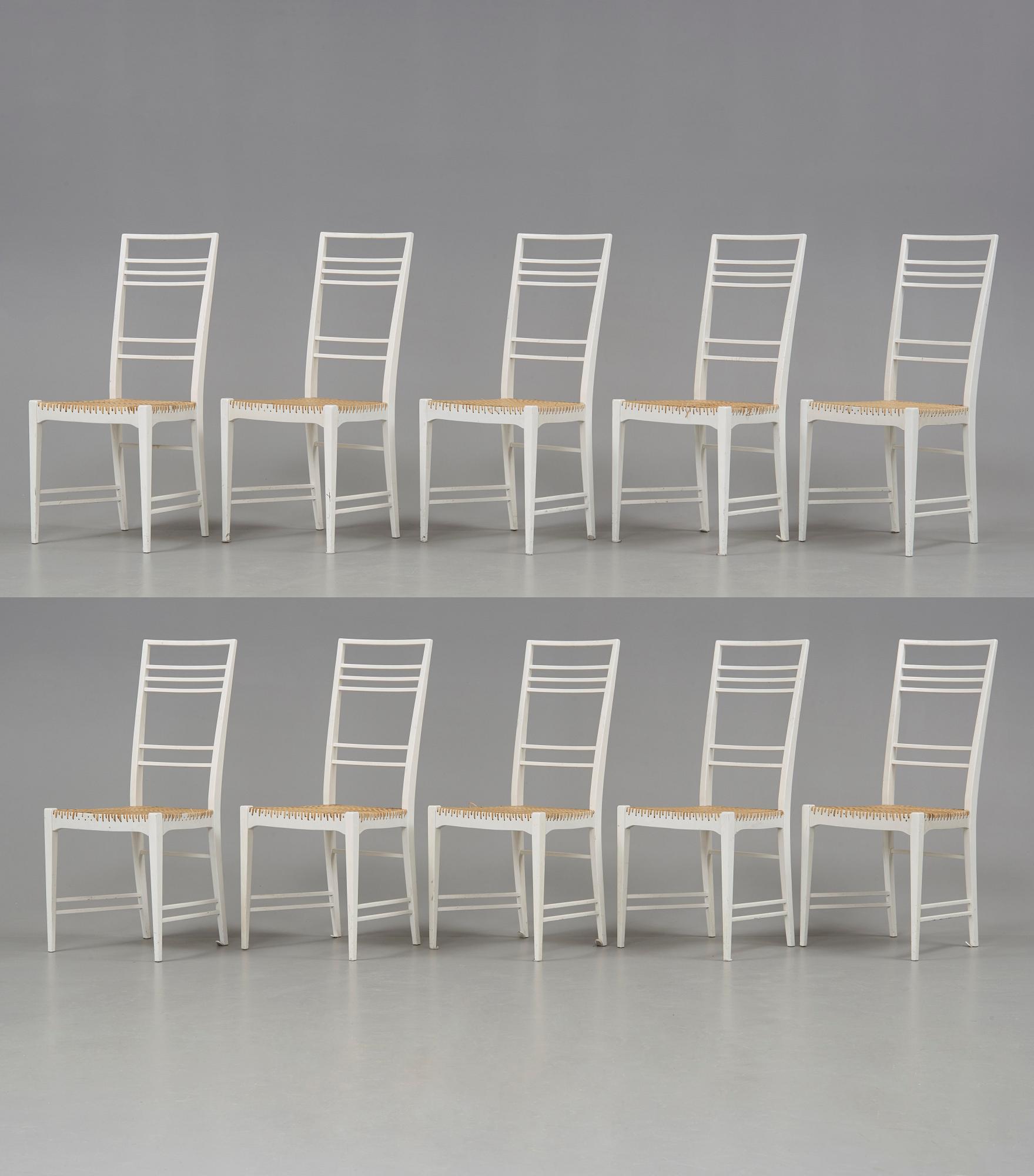 A set of 10 Erik Chambert 'Poem' white lacquered and rattan chairs, Chambert's, Sweden 1950's.