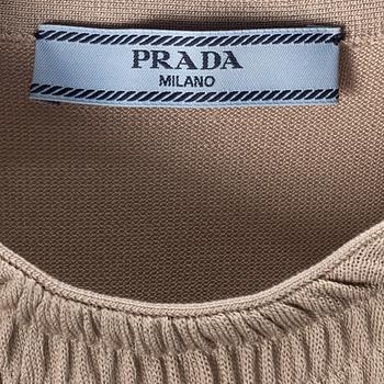 Prada, a set of three silk tops, size 40.