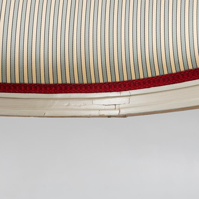 A late Gustavian style armchair, late 20th Century.