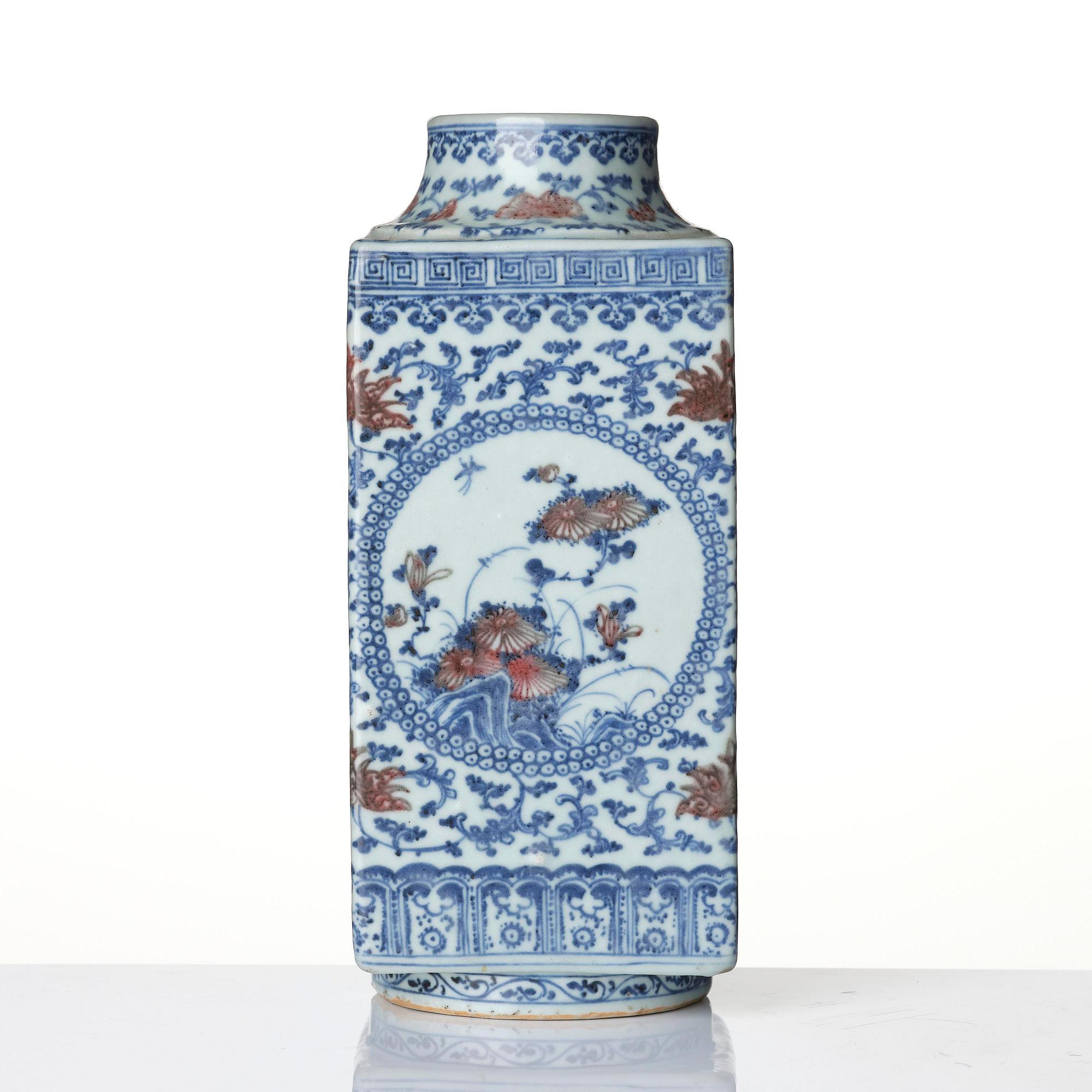 An underglaze blue and copper-red 'crane and deer' cong vase, Qing dynasty, 18/19th century.