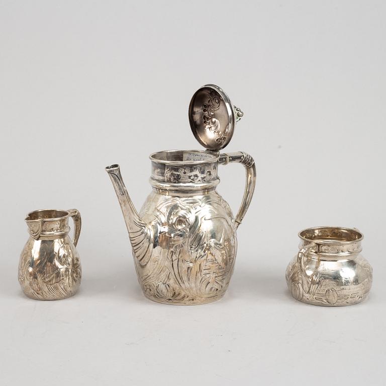 A Swedish silver coffee pot, creamer and sugar bowl, mark of Emil Oscar Möller, Malmö 1907.