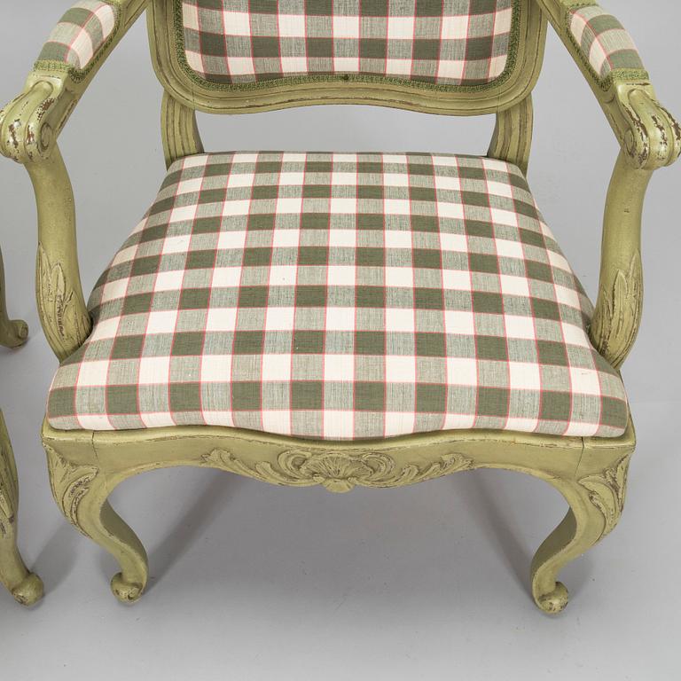 A pair of 20th century  Rococo style armchairs.