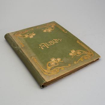 An early 20th century album with paper bookmarks.