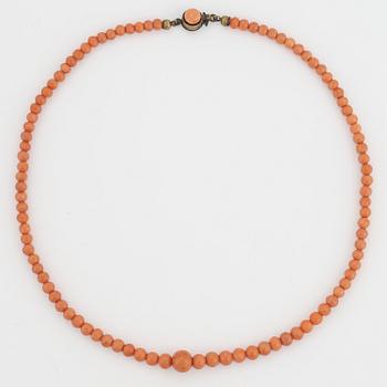 Coral bead necklace.