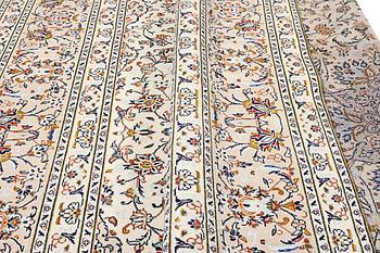 A Kashan carpet, c. 403 x 300 cm.