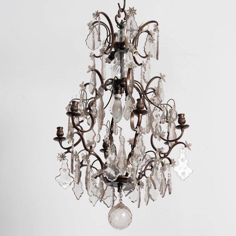 A Rococo style chandelier, early 20th century.