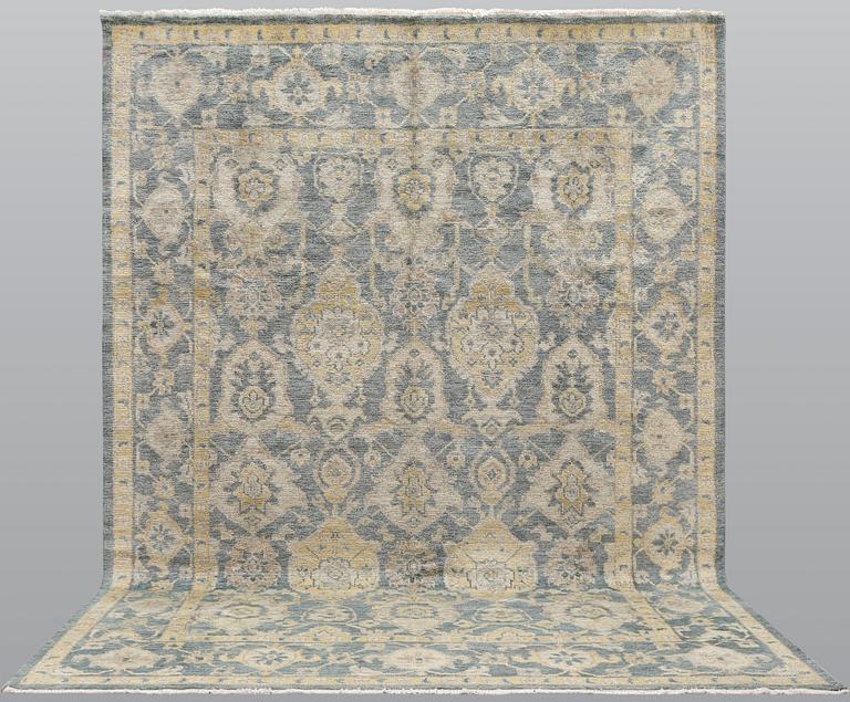 An oriental carpet, ca 425 x 300 cm.