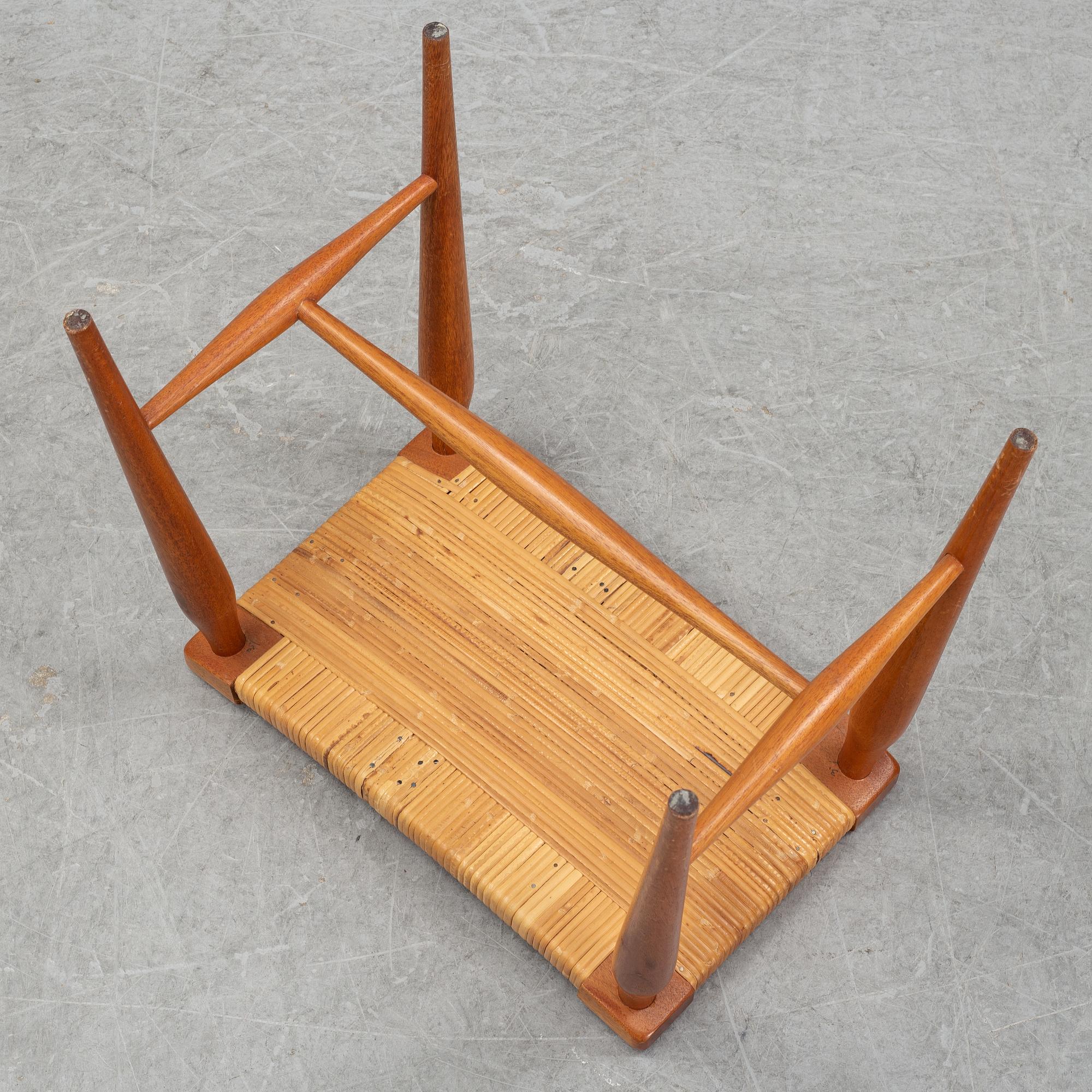 A model '967' mahogany and rattan stool by Josef Frank for Firma Svenskt Tenn.