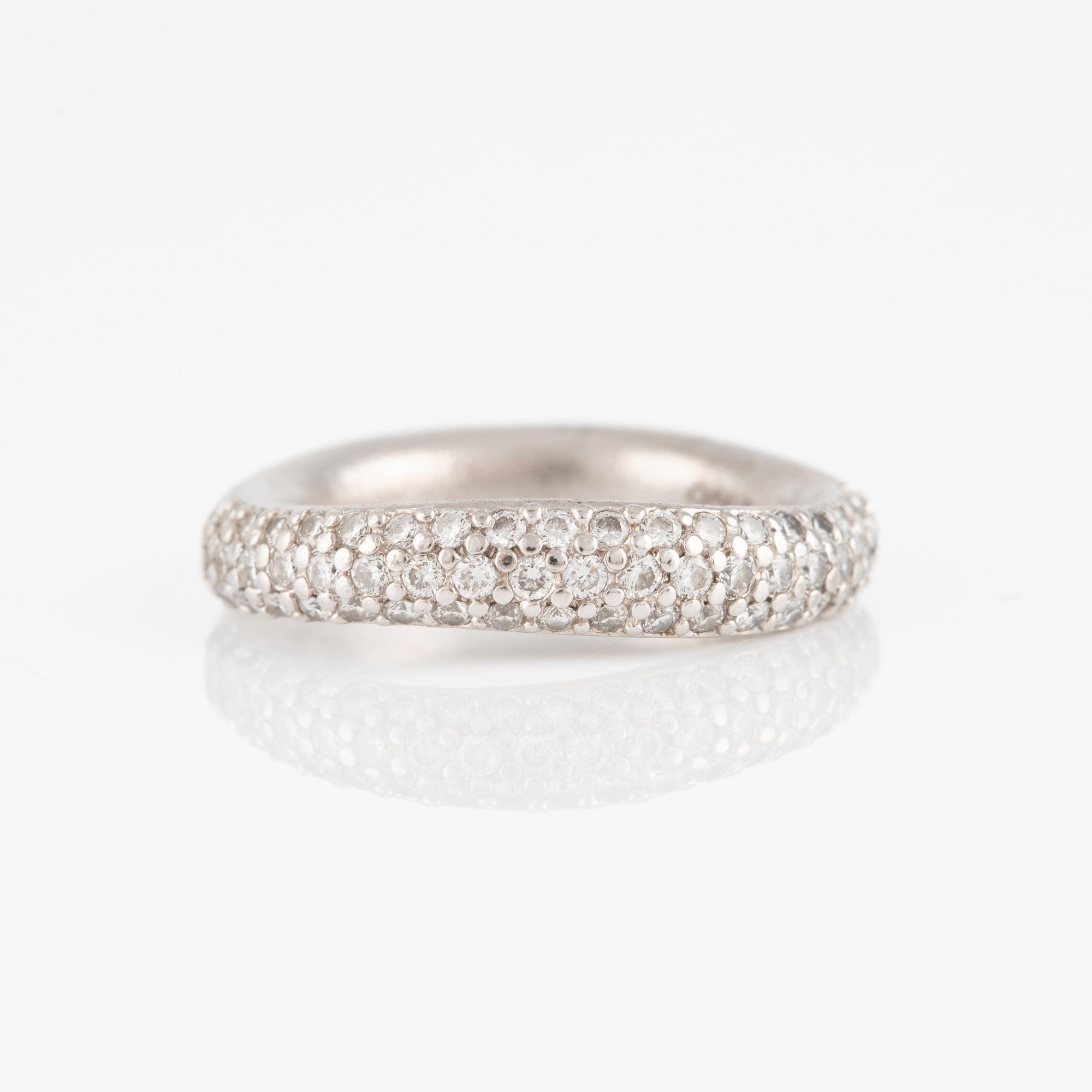 Ole Lynggaard two "Love" rings no. 4 in 18K white gold with round brilliant-cut diamonds.