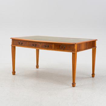 An english style writing desk and chair, second half of the 20th century.