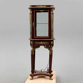 An Empire style cabinet, mid 20th Century.
