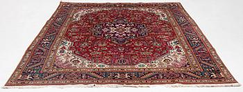 A Tabriz carpet, c. 342 x 245 cm.