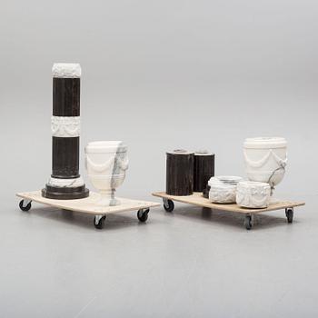 A pair of second half of the 20th century marble pedestals.