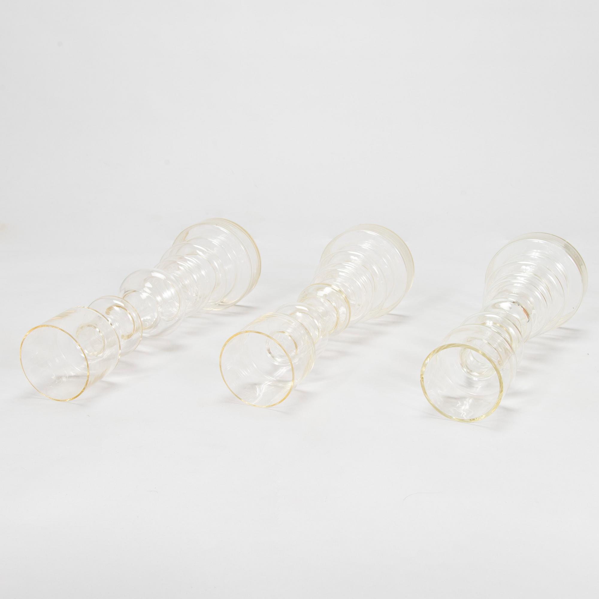 Oiva Toikka, Three 'Lighthouse' glass candle holders / vases, two signed Notsjö Nuutajärvi.