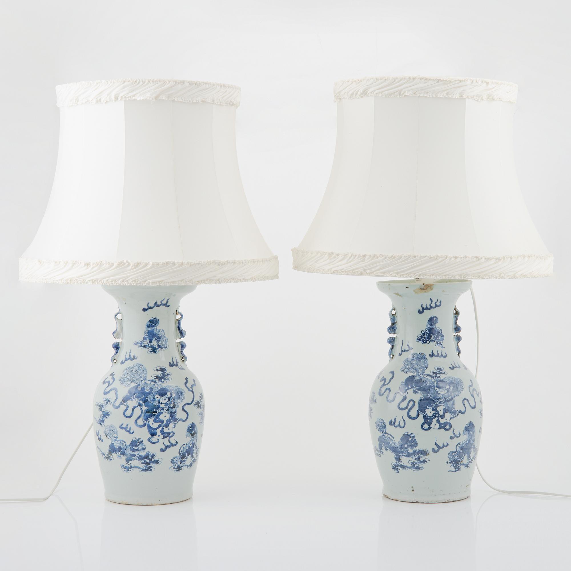 A pair of Chinese vases, mounted as lamps, early 20th Century.
