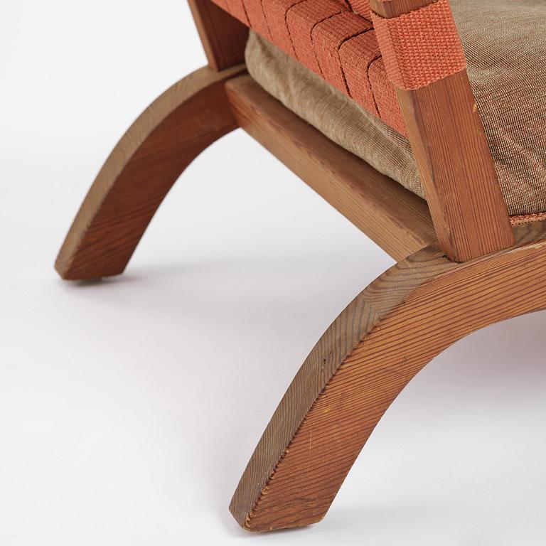Axel Einar Hjorth, a stained pine "Väddö" easy chair, Nordiska Kompaniet, Sweden, 1930s-40s.