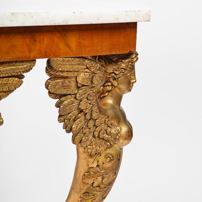 A presumably Austrian Empire centre table, early 19th century.