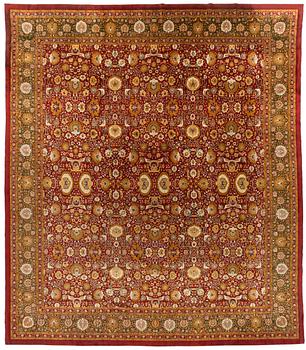 An antique Lahore carpet, northern India (todays Pakistan), approx. 463 x 404 cm.