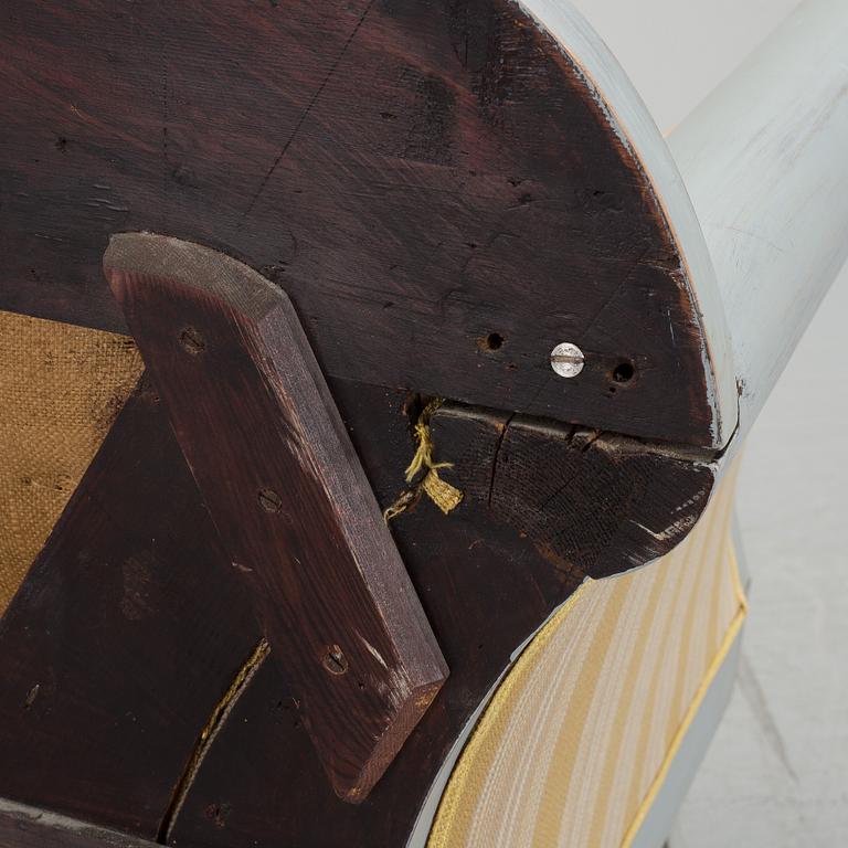 A mid 19th century painted sofa.