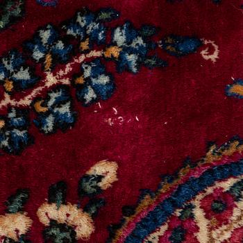 A Kerman carpet, c. 365 x 265 cm.
