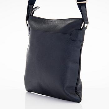 Louis Vuitton, a Navy Taiga 'Sasha' Messenger bag.