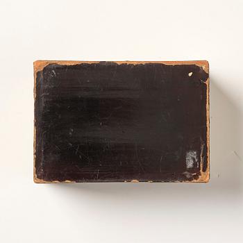 A lacquer tea box and a blanc de chine cup, Qing dynasty 18/19th century.