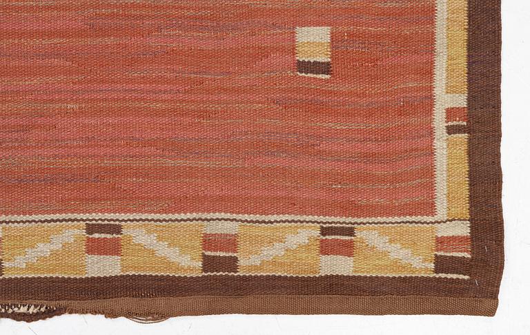 A flat weave carpet, c. 360 x 265 cm.