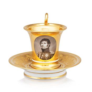 342. A French Empire cup by Darte Freres a Paris, with a portrait of the Swedish King Carl XIV Johan.